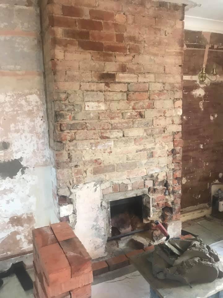 Picture of a fireplace being renovated